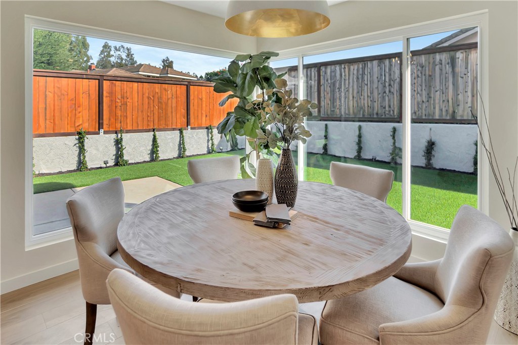 545 North Broadmoor Trail Orange, CA 92869 - Photo 14 of 75 a dining room with furniture and a potted plant