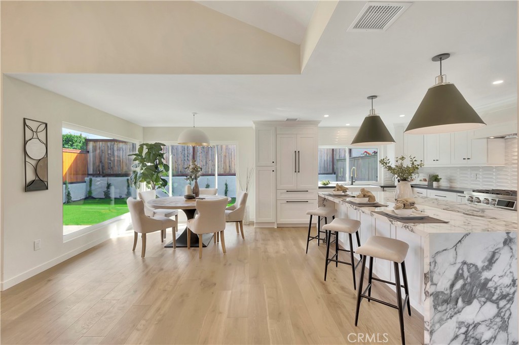 545 North Broadmoor Trail Orange, CA 92869 - Photo 31 of 75 a view of a dining room with furniture window and wooden floor