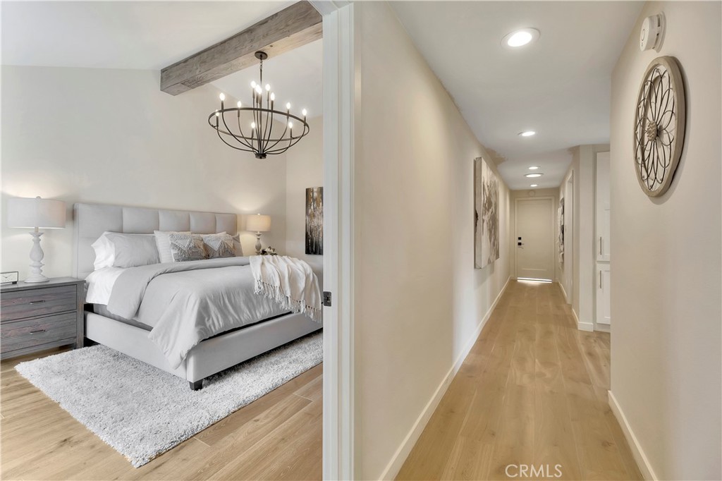 545 North Broadmoor Trail Orange, CA 92869 - Photo 37 of 75 a bedroom with a bed and painting on the wall