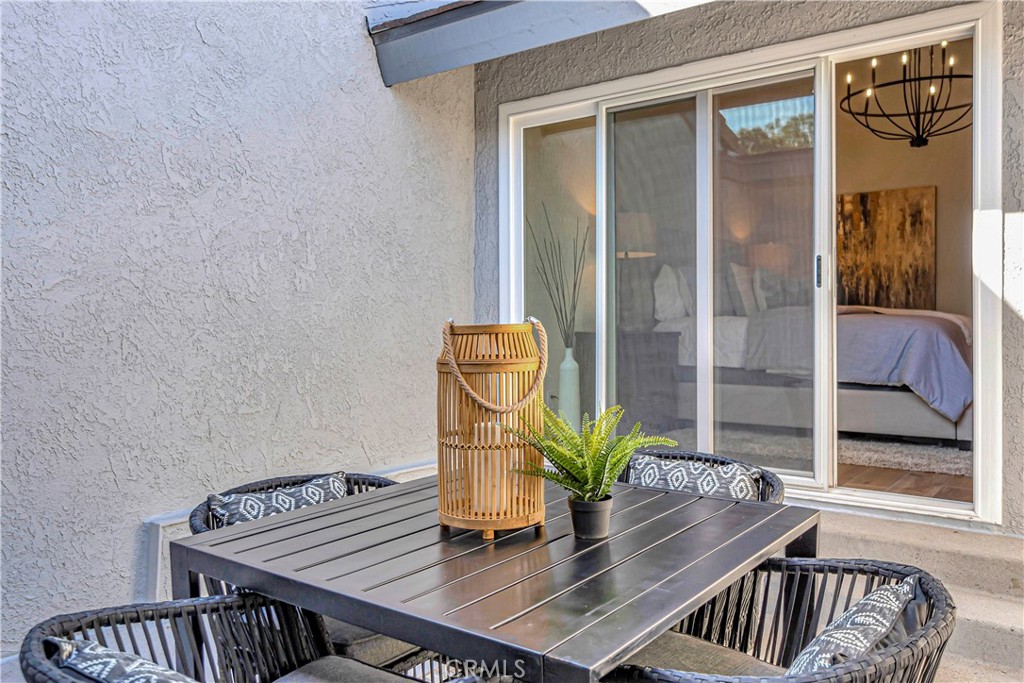 545 North Broadmoor Trail Orange, CA 92869 - Photo 39 of 75 a view of a dining room with furniture and a potted plant