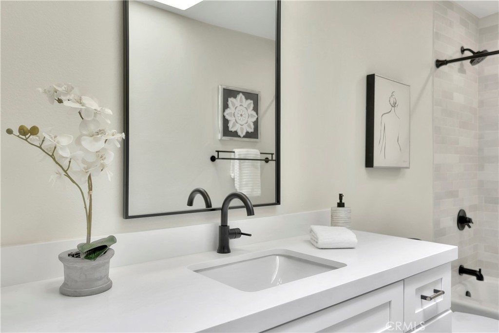 545 North Broadmoor Trail Orange, CA 92869 - Photo 51 of 75 a bathroom with a sink and a mirror