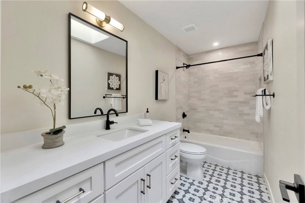 545 North Broadmoor Trail Orange, CA 92869 - Photo 52 of 75 a bathroom with a double vanity sink toilet and shower