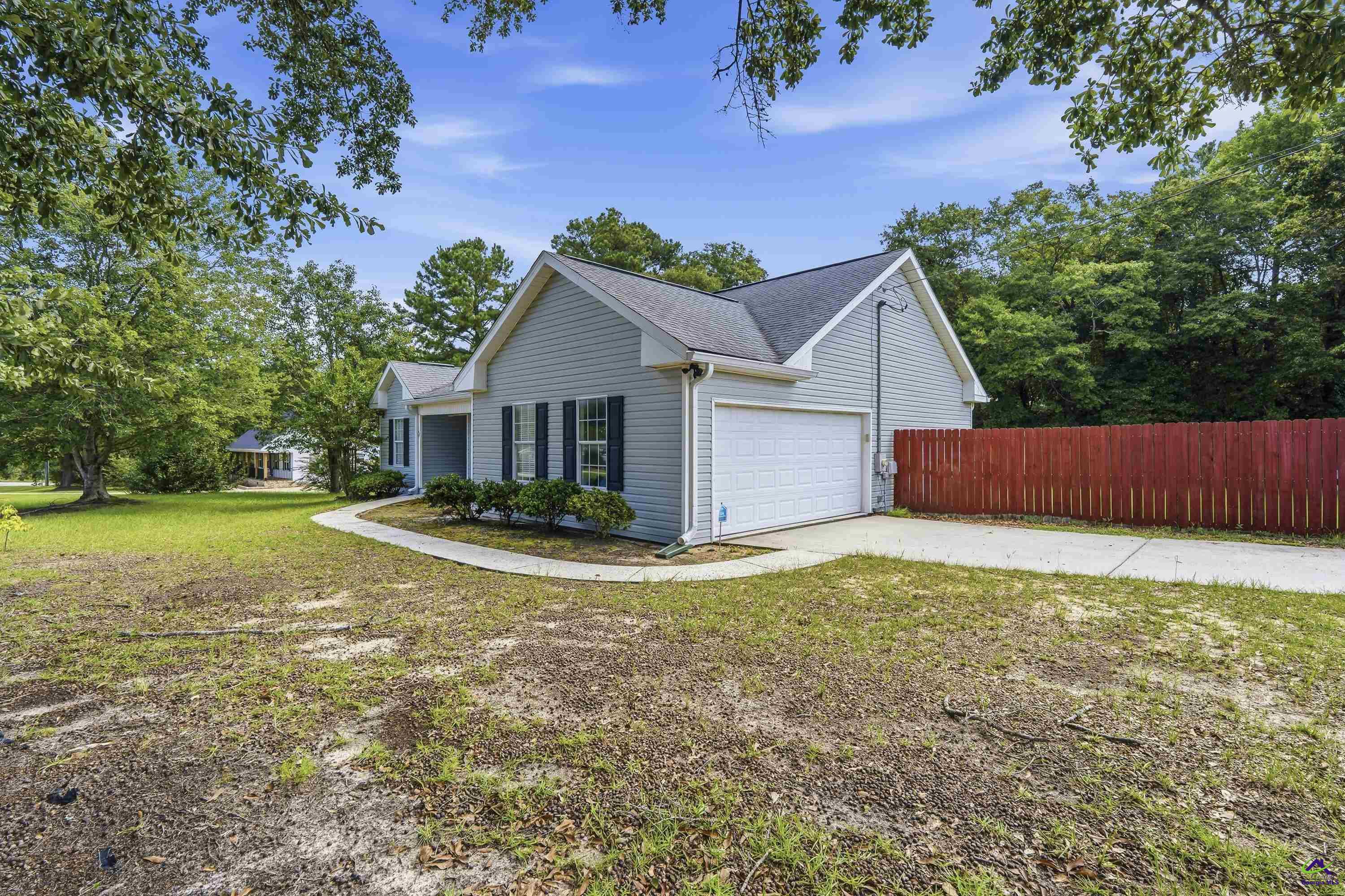 23 Breeze Point Byron, GA 31008 - Photo 2 of 38 a view of a house with backyard and tree