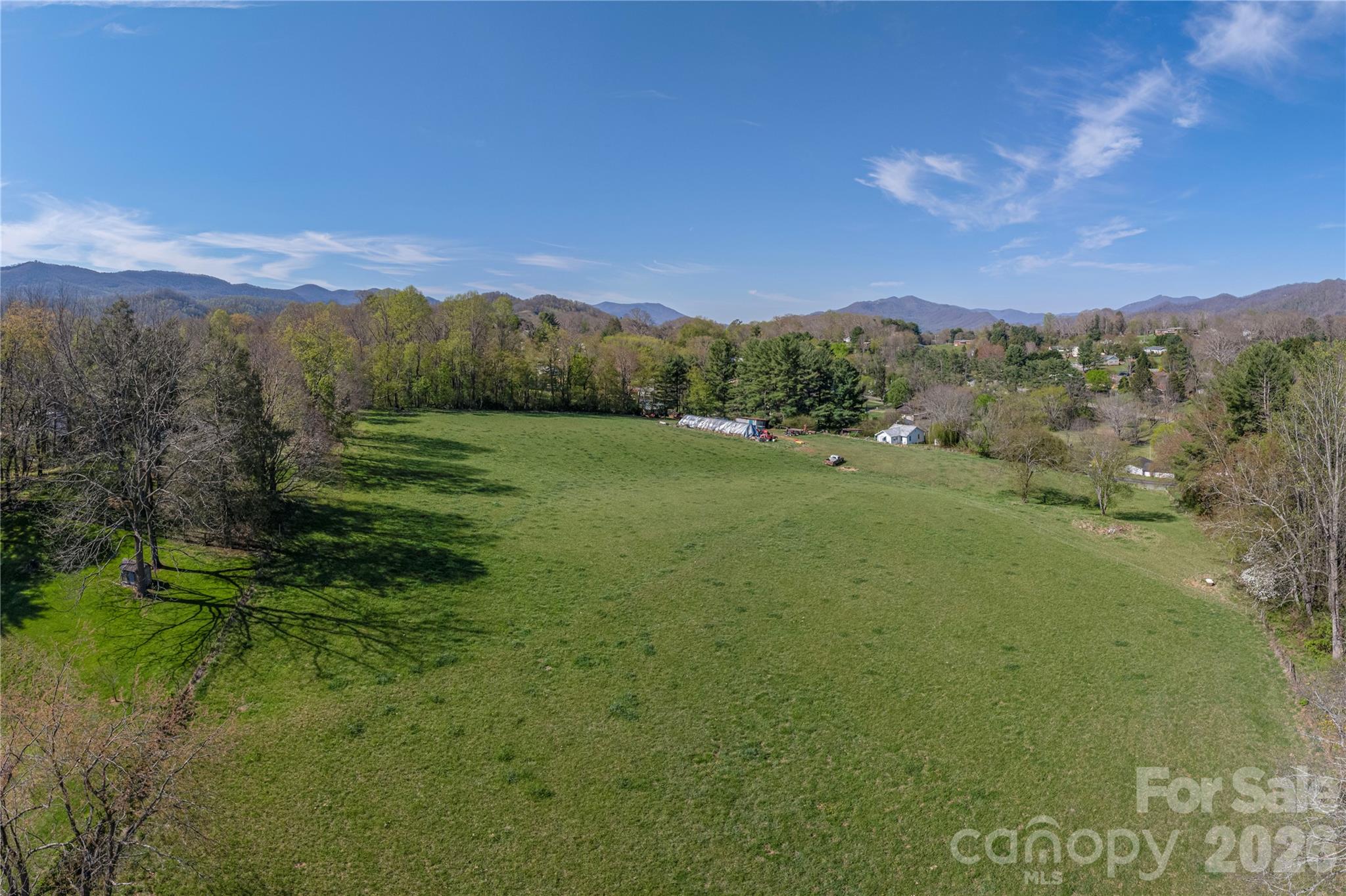 284 Woodland Church Road Clyde, NC 28721 - Photo 1 of 25 a view of an outdoor space and mountain view