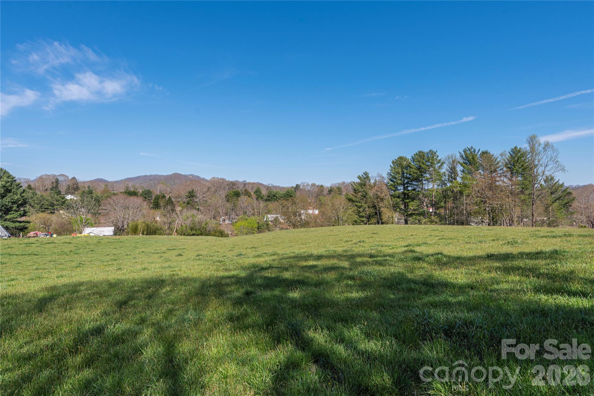 284 Woodland Church Road Clyde, NC 28721 - Photo 13 of 25 a view of an outdoor space and a yard