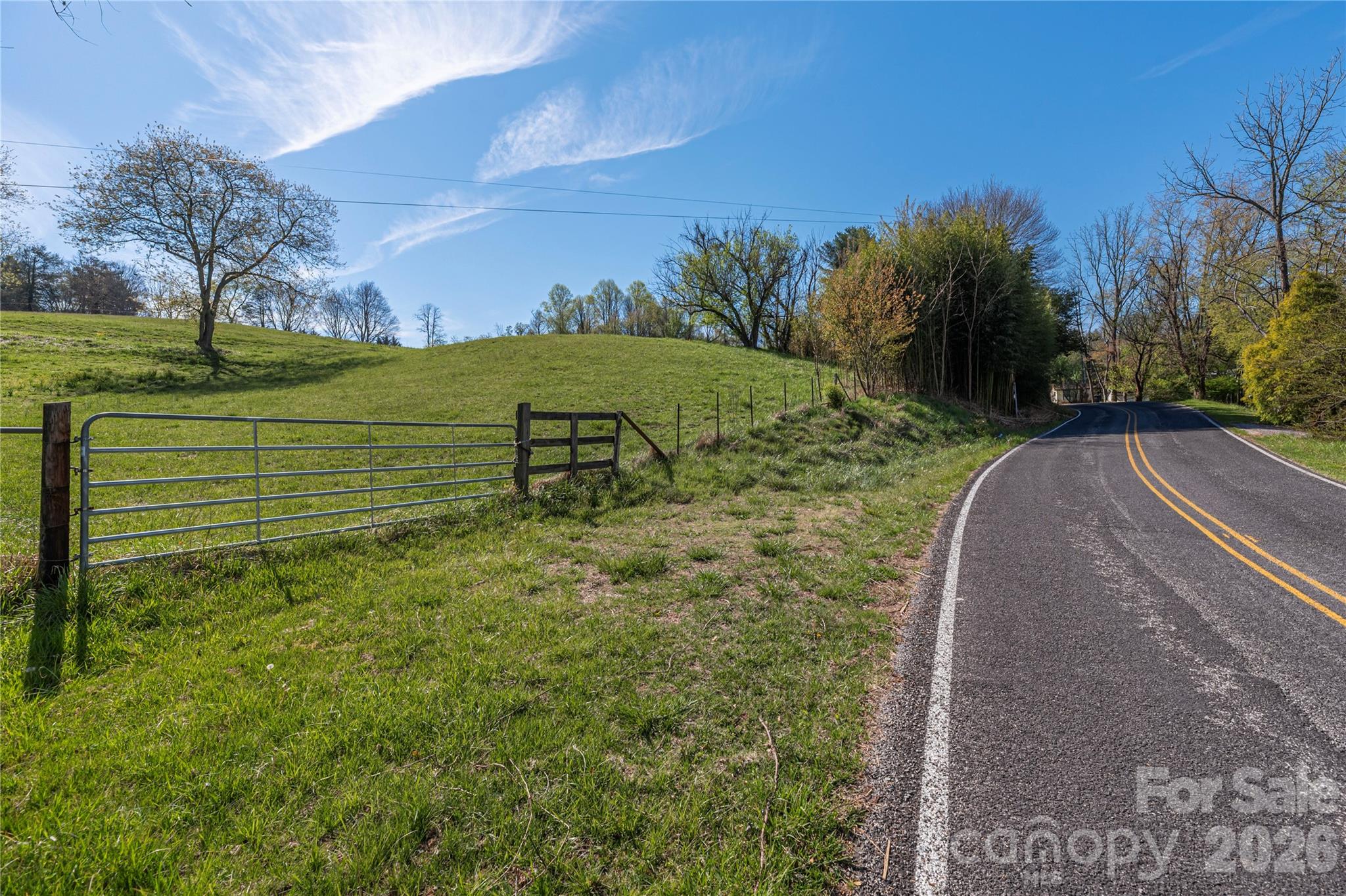 284 Woodland Church Road Clyde, NC 28721 - Photo 20 of 25 a view of a backyard