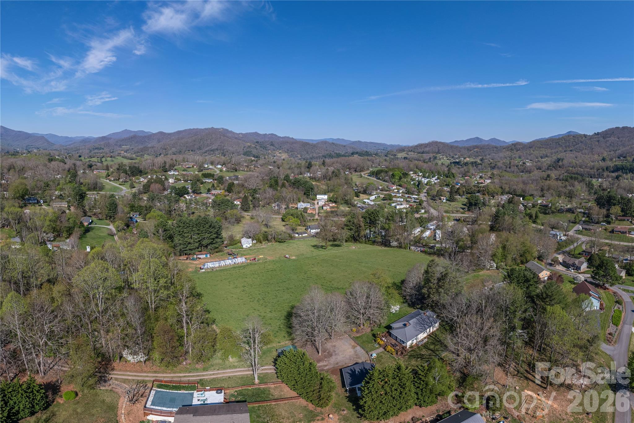 284 Woodland Church Road Clyde, NC 28721 - Photo 25 of 25 an aerial view of a house with a yard