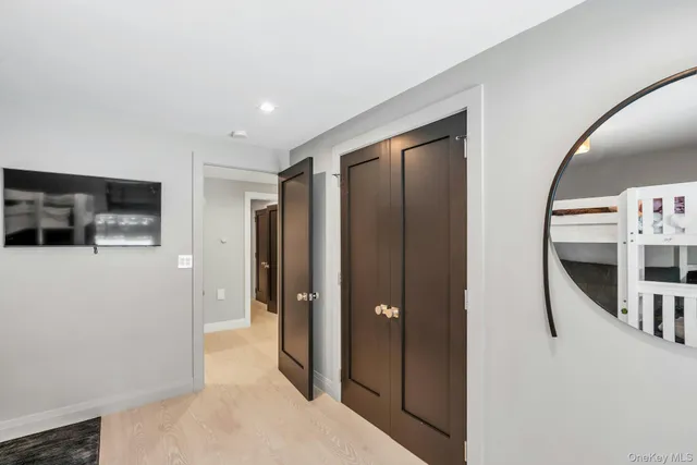 a view of a livingroom with furniture and flat screen tv
