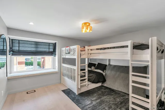 a view of a livingroom with furniture and windows