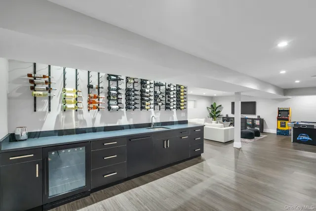 a kitchen with sink and cabinets