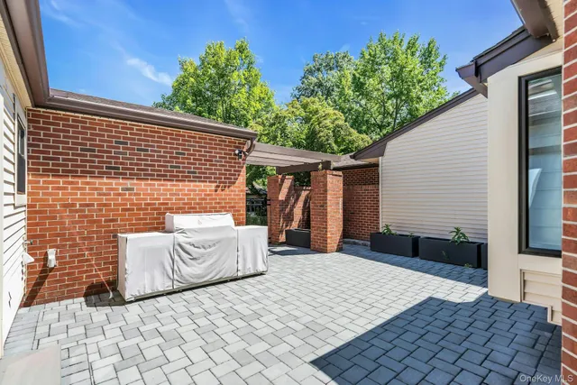 a backyard of a house with seating space