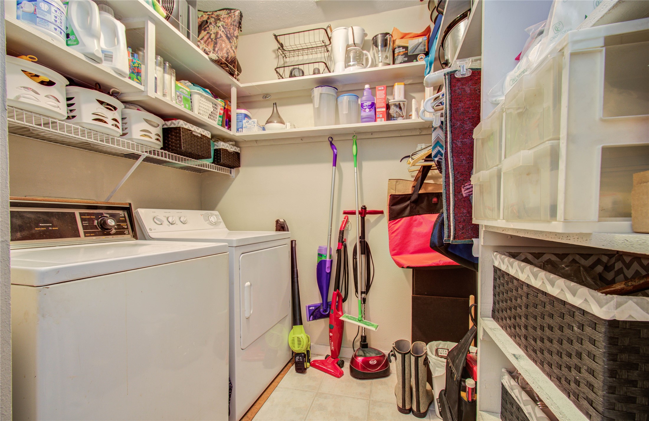 5927 Thom Road Humble, TX 77346 - Photo 17 of 50 Spacious laundry/utility room featuring extra storage