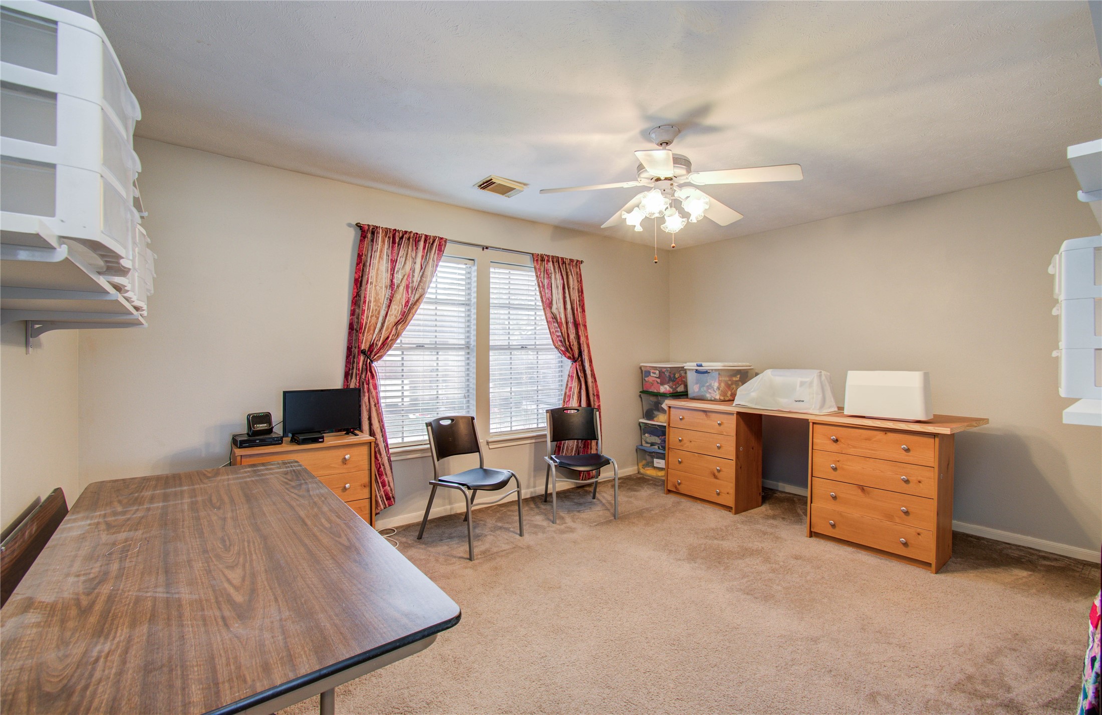 5927 Thom Road Humble, TX 77346 - Photo 30 of 50 One of the upstairs bedrooms is generously sized and features ample closet space.