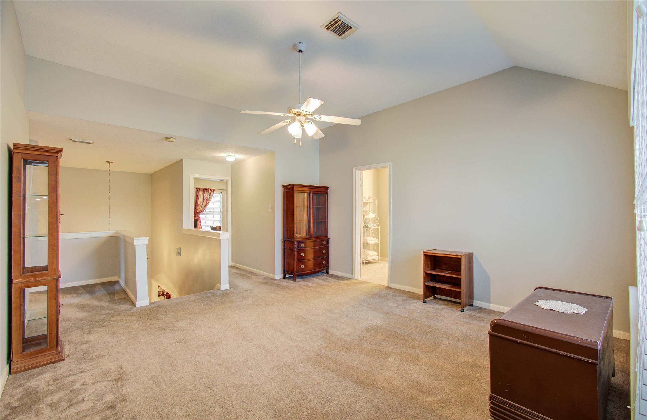 5927 Thom Road Humble, TX 77346 - Photo 35 of 50 At the top of the stairs, an open flex area offers versatile space for a variety of uses.