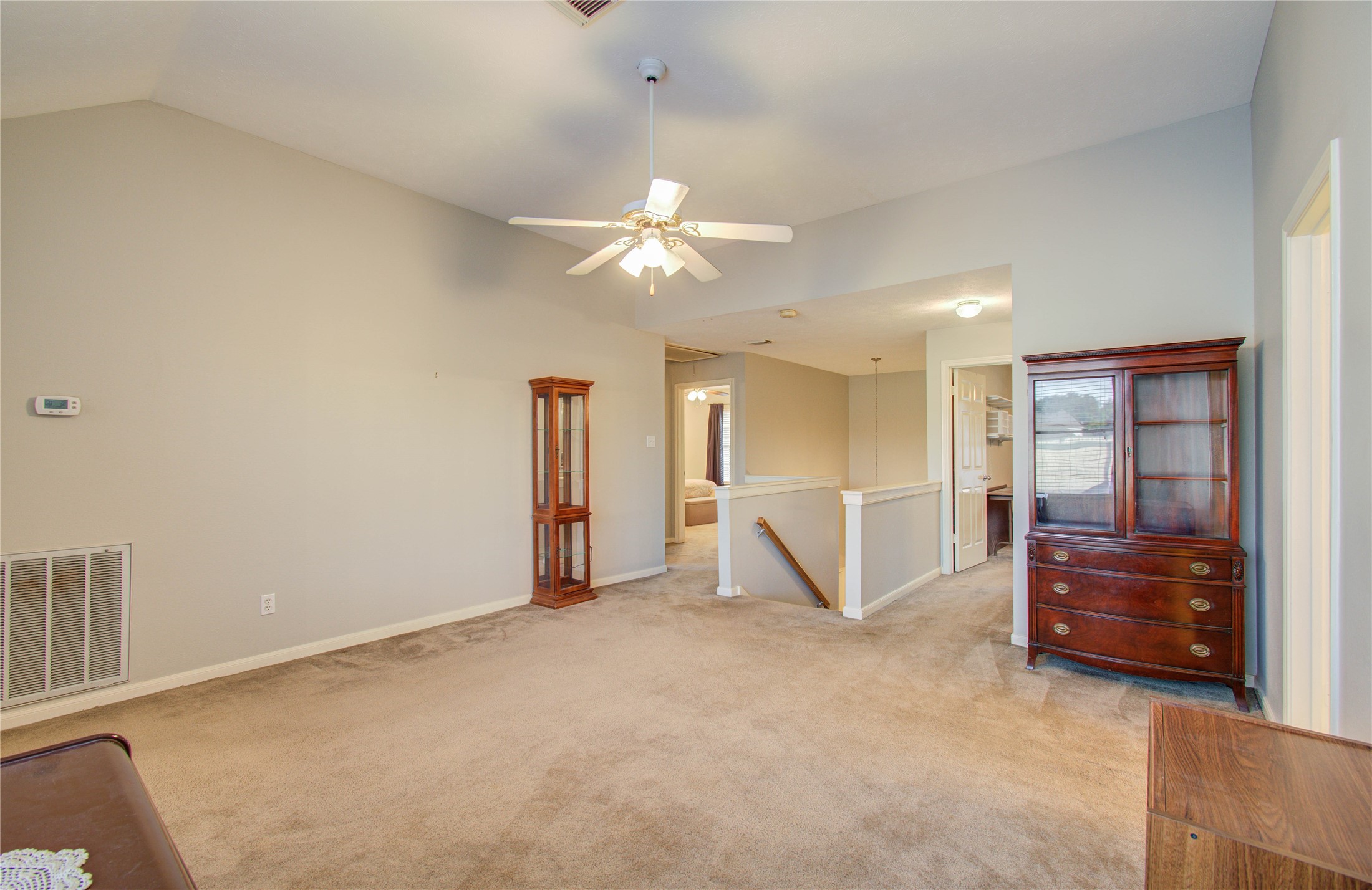 5927 Thom Road Humble, TX 77346 - Photo 36 of 50 At the top of the stairs, an open flex area offers versatile space for a variety of uses.