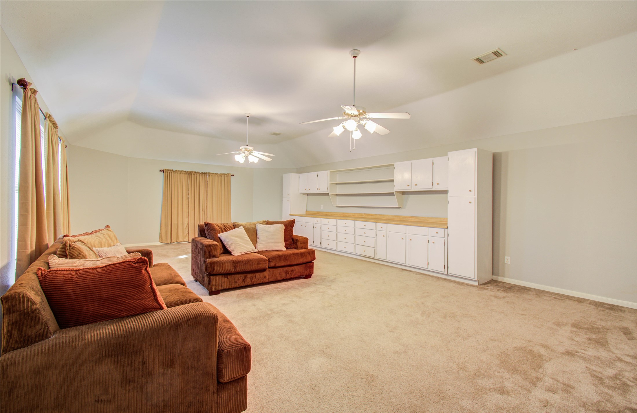 5927 Thom Road Humble, TX 77346 - Photo 38 of 50 Upstairs, an oversized game room provides generous built-in storage and flexible space.
