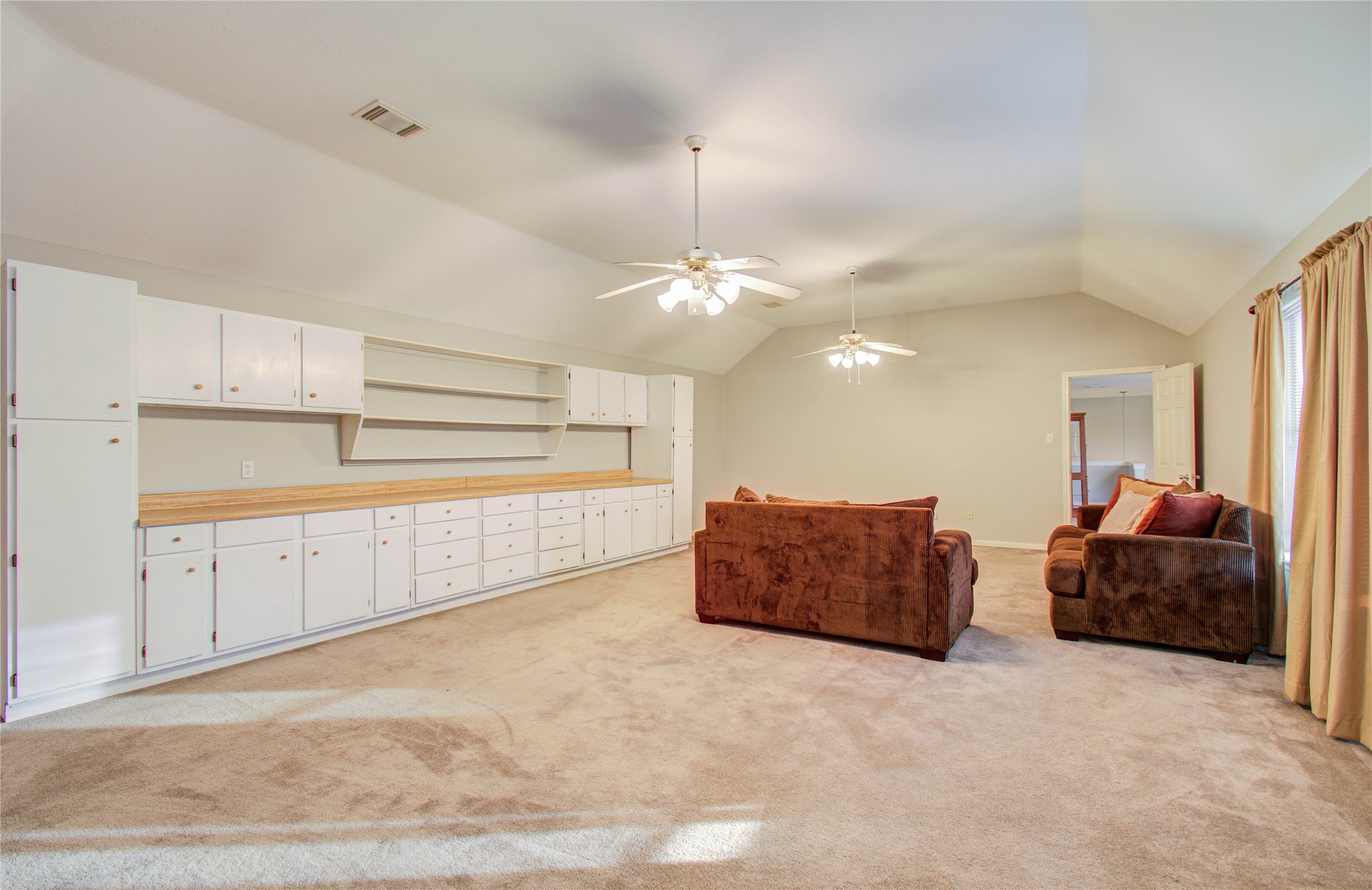 5927 Thom Road Humble, TX 77346 - Photo 40 of 50 Upstairs, an oversized game room provides generous built-in storage and flexible space.