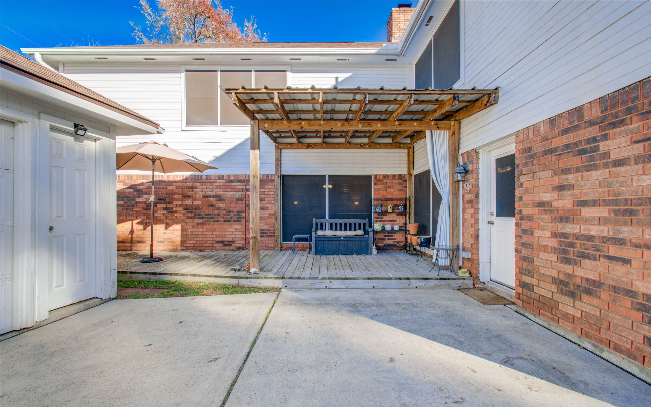 5927 Thom Road Humble, TX 77346 - Photo 47 of 50 Cozy covered patio area offering a perfect spot to unwind or enjoy your morning coffee.