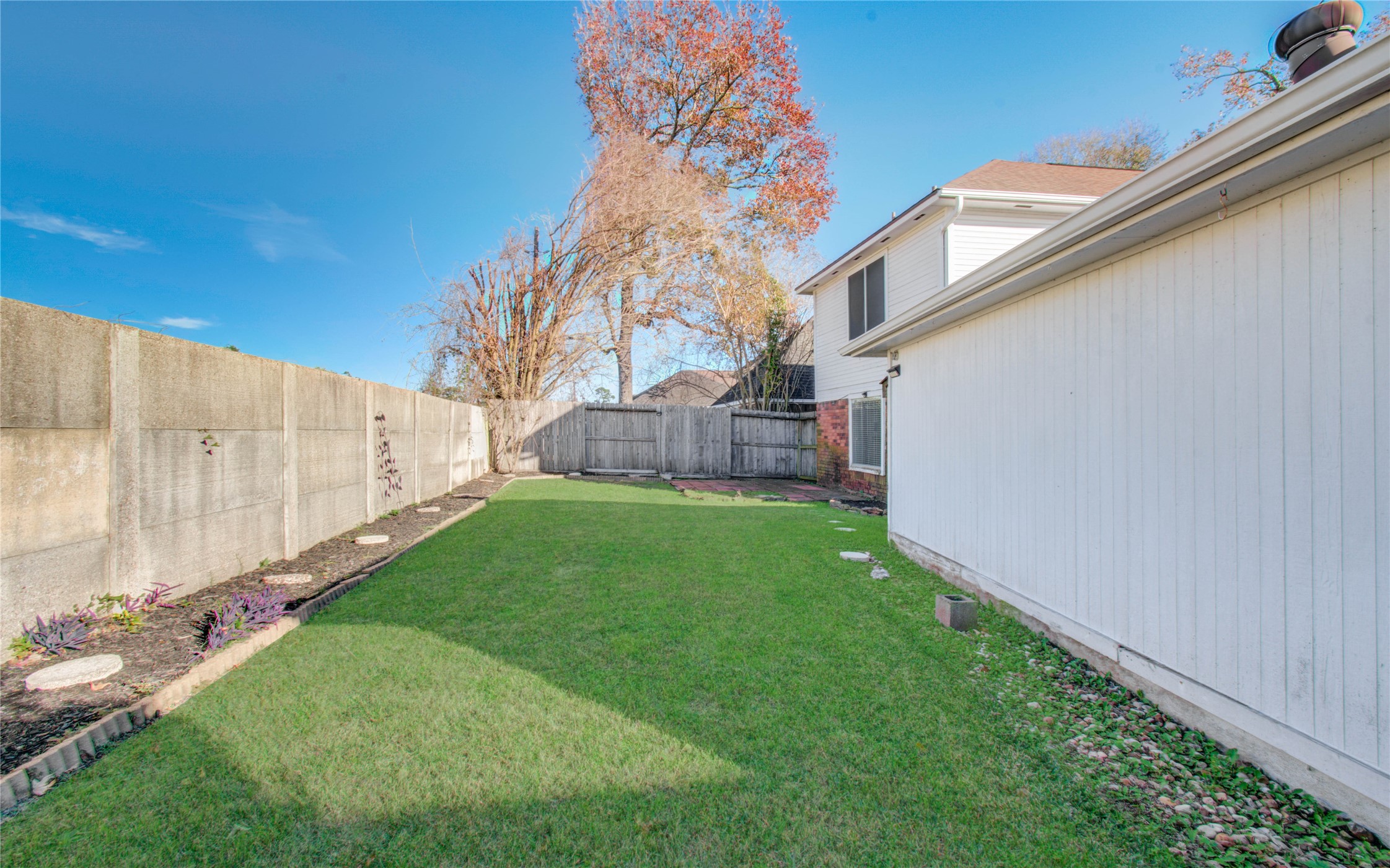 5927 Thom Road Humble, TX 77346 - Photo 49 of 50 Backyard includes flower beds ready for your custom landscaping—perfect for creating your own outdoor oasis.