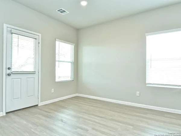 an empty room with windows