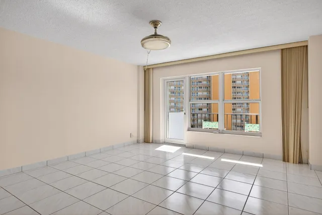 a view of a kitchen with a window