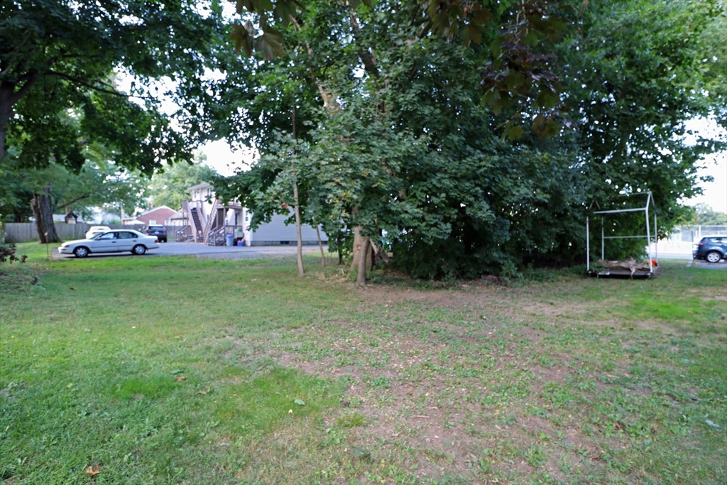 184 Howard Street Ludlow, MA 01056 - Photo 4 of 18 a view of a park with large trees