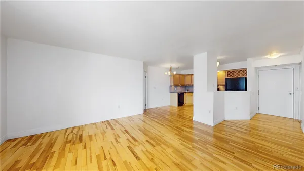 a view of a room with wooden floor and floors