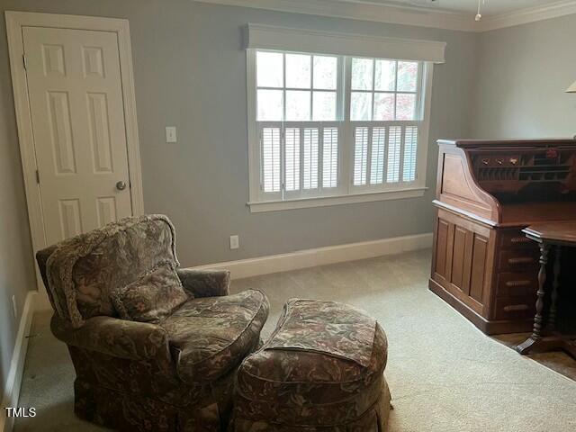 1425 Bascomb Drive Raleigh, NC 27614 - Photo 22 of 51 a bed sitting in a bedroom next to a window