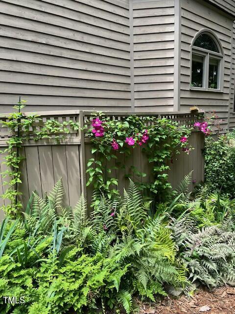 1425 Bascomb Drive Raleigh, NC 27614 - Photo 27 of 51 a view of a potted plant sitting in front of a house