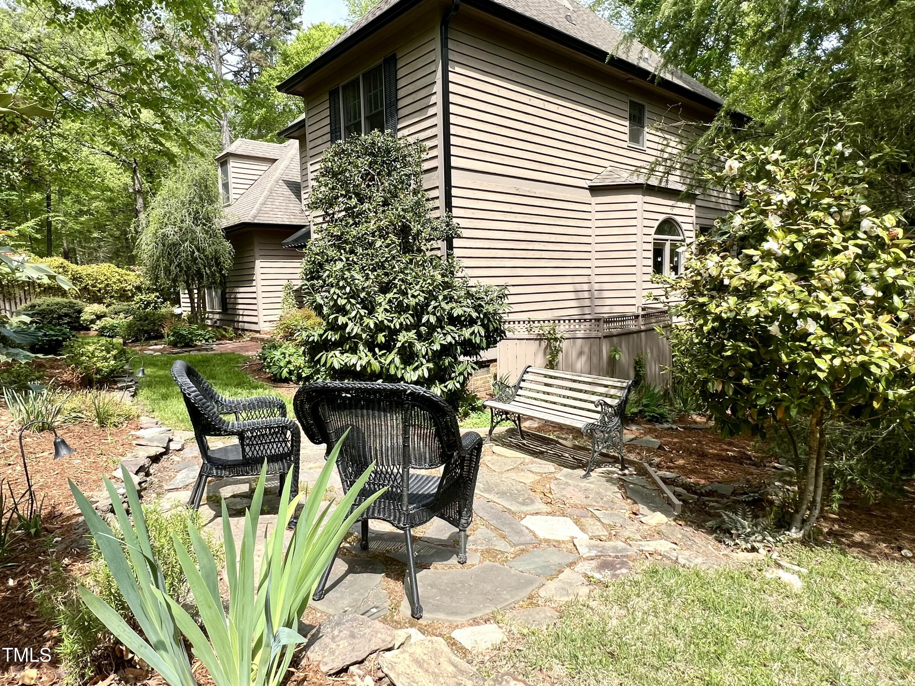 1425 Bascomb Drive Raleigh, NC 27614 - Photo 34 of 51 a view of a chair and table in backyard