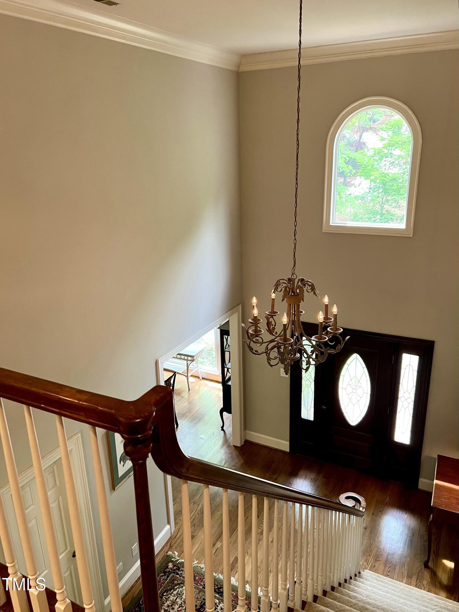 1425 Bascomb Drive Raleigh, NC 27614 - Photo 3 of 51 a view of a dining room with furniture and a chandelier