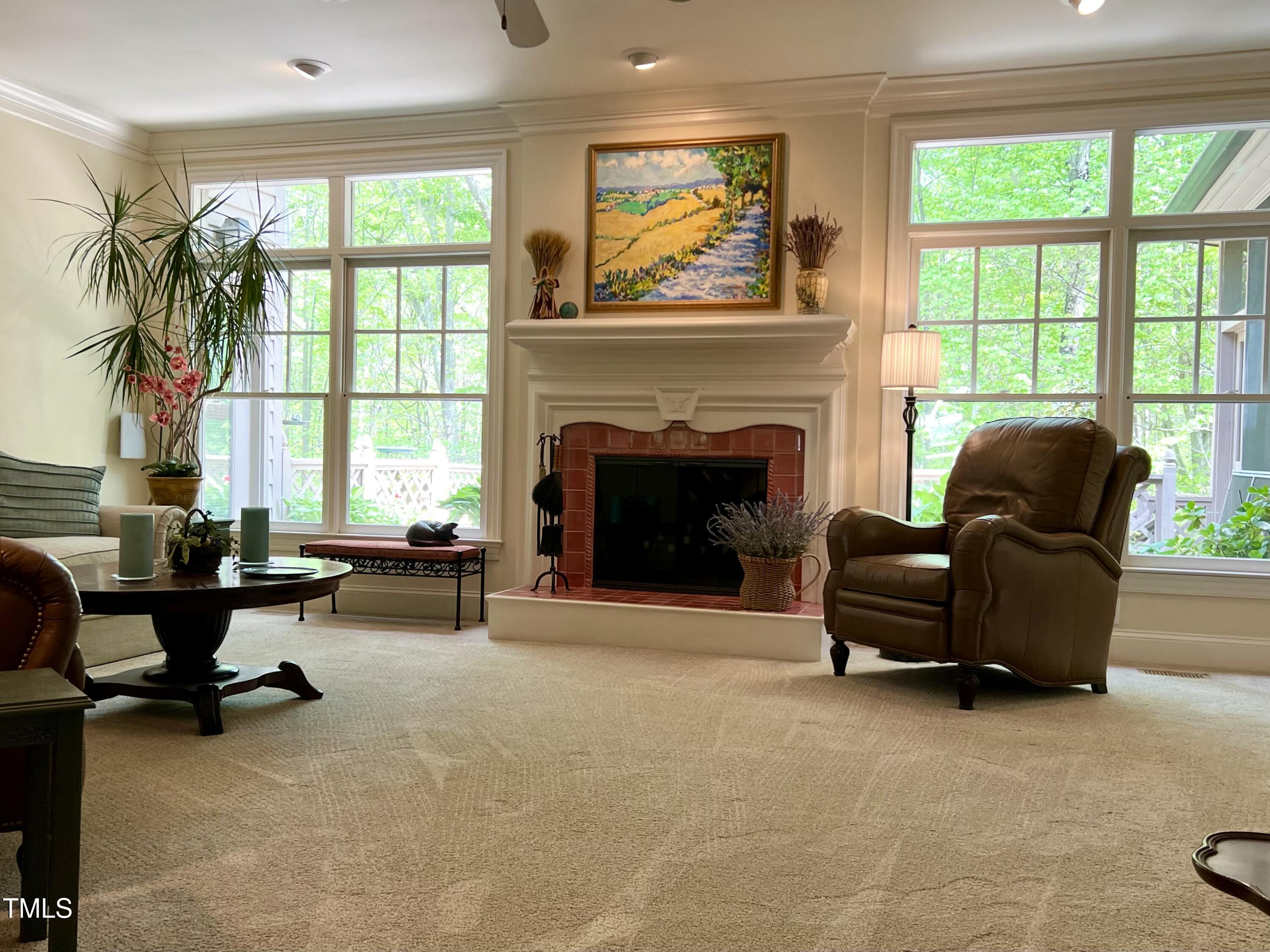 1425 Bascomb Drive Raleigh, NC 27614 - Photo 6 of 51 a living room with furniture and a fireplace