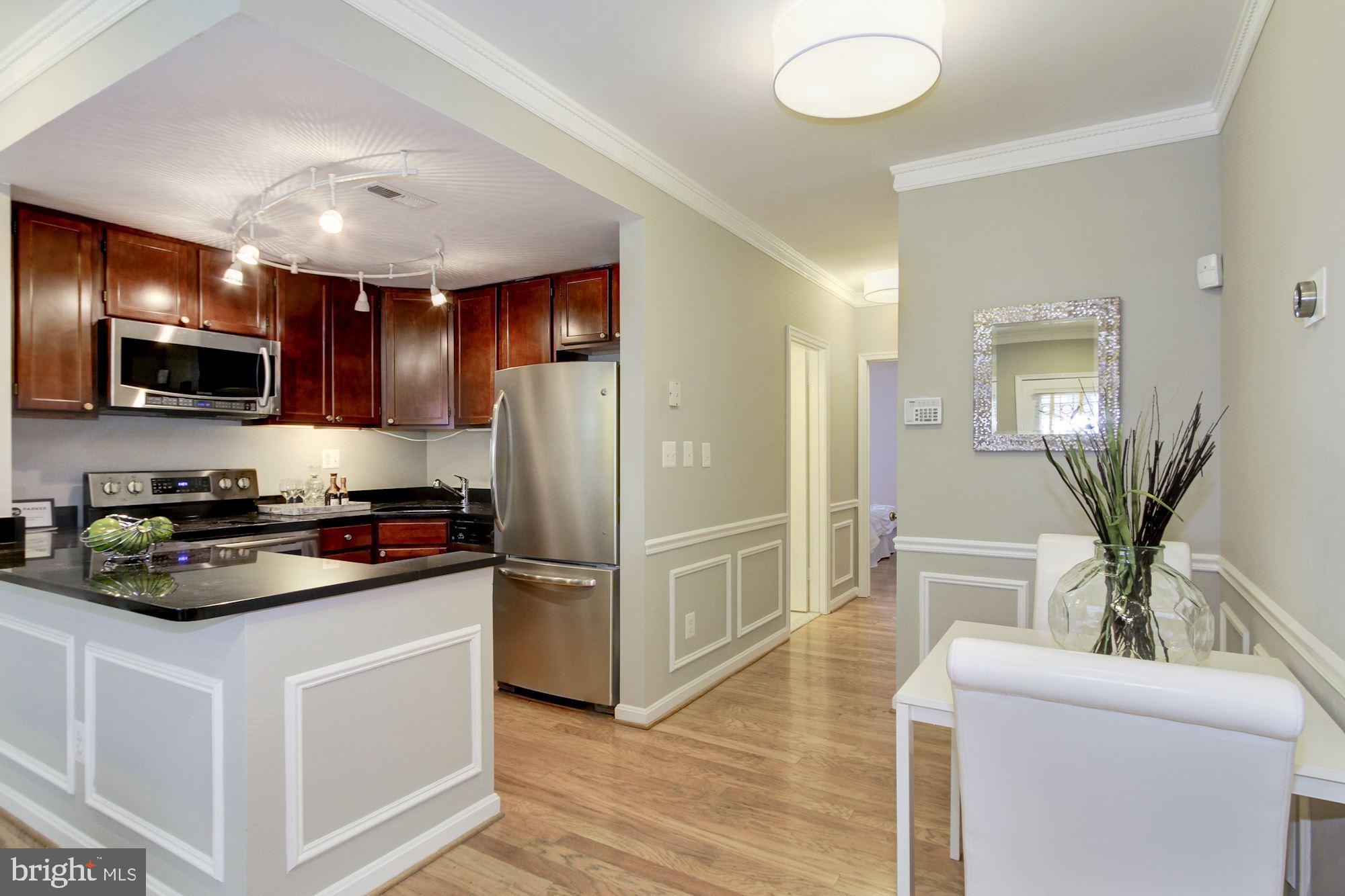 1205 N Street Northwest, Unit A Washington, DC 20005 - Photo 11 of 25 Open kitchen with cute dining area