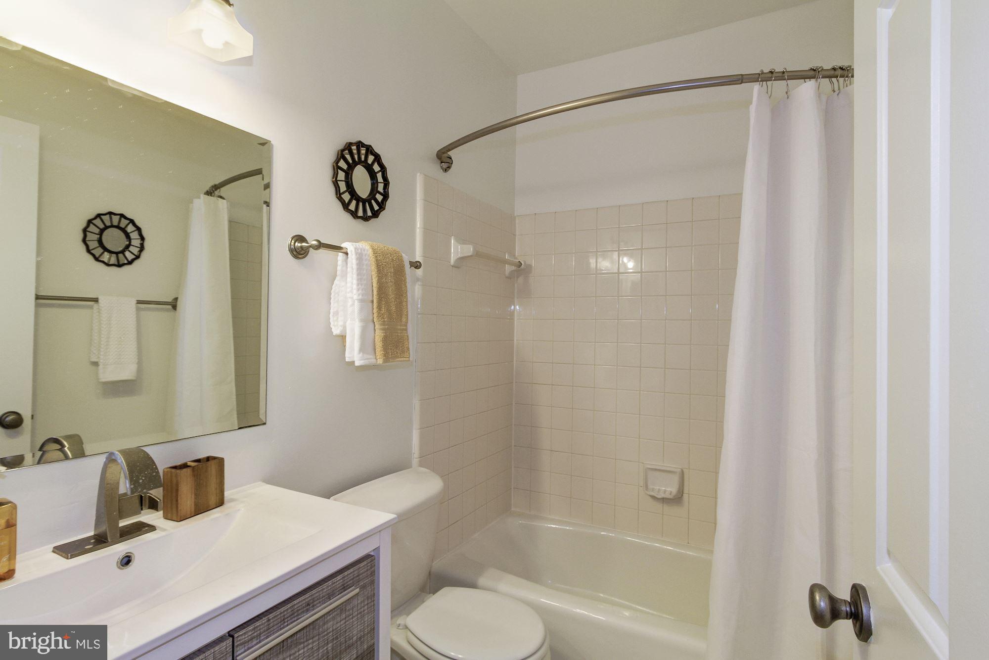 1205 N Street Northwest, Unit A Washington, DC 20005 - Photo 19 of 25 The bathroom is modern