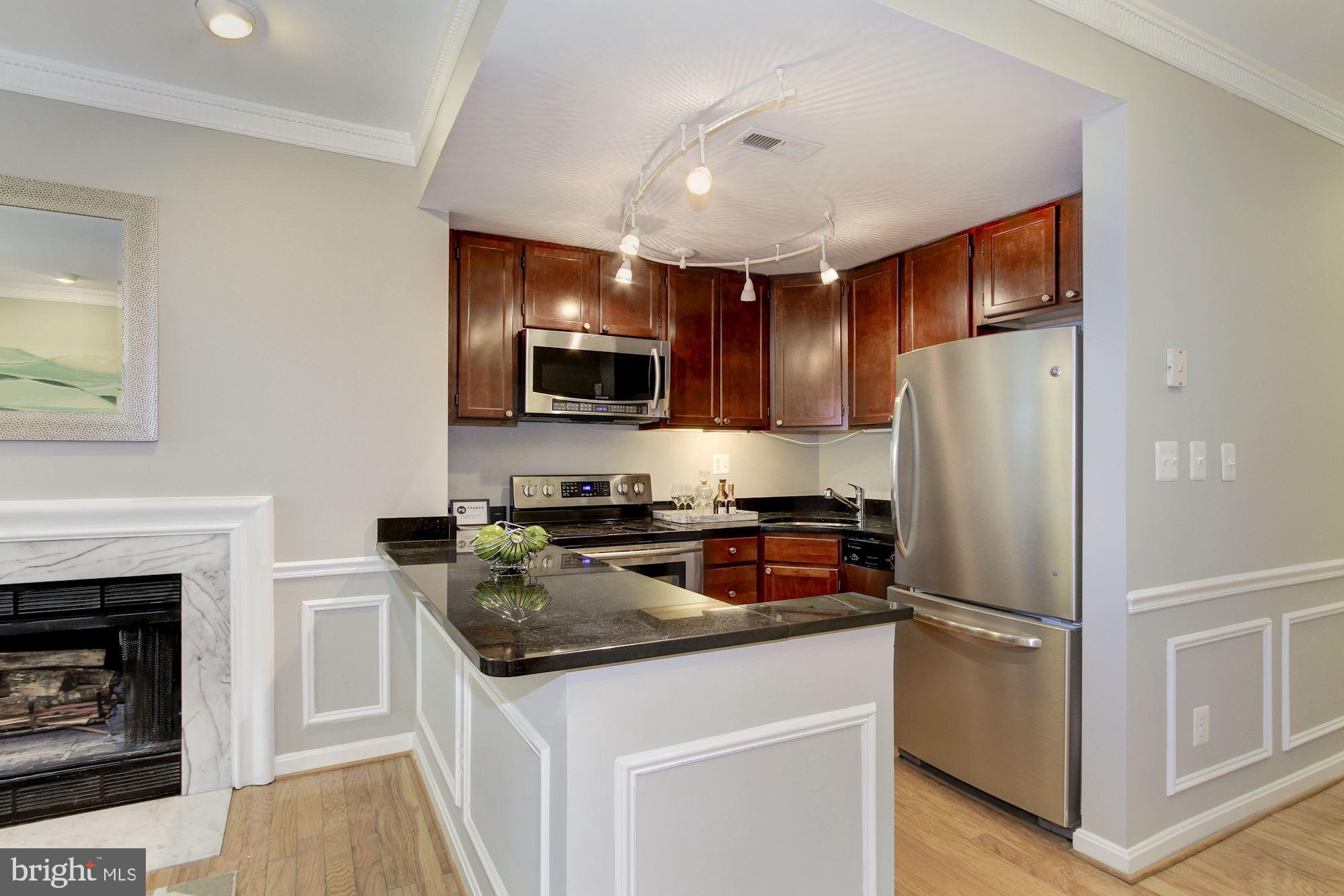 1205 N Street Northwest, Unit A Washington, DC 20005 - Photo 7 of 25 Gourmet kitchen with granite counter tops