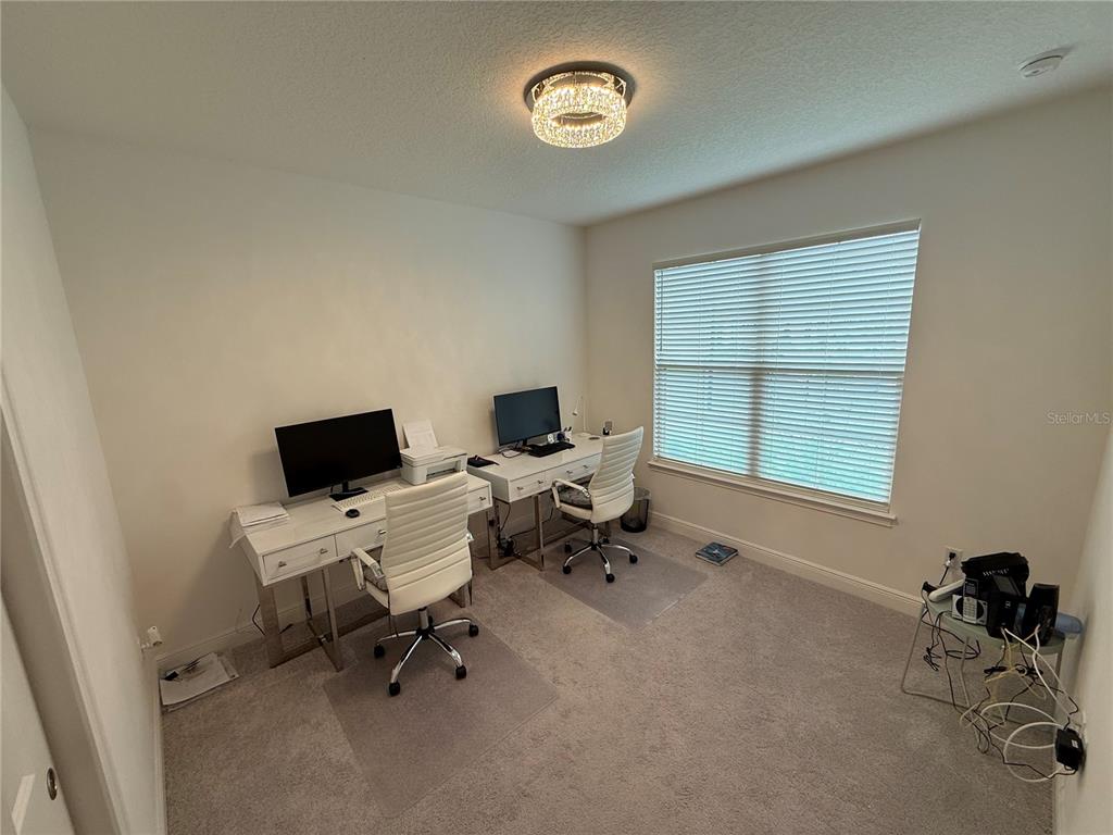 3112 Oxbow Court Harmony, FL 34773 - Photo 11 of 22 a view of a workspace with a window