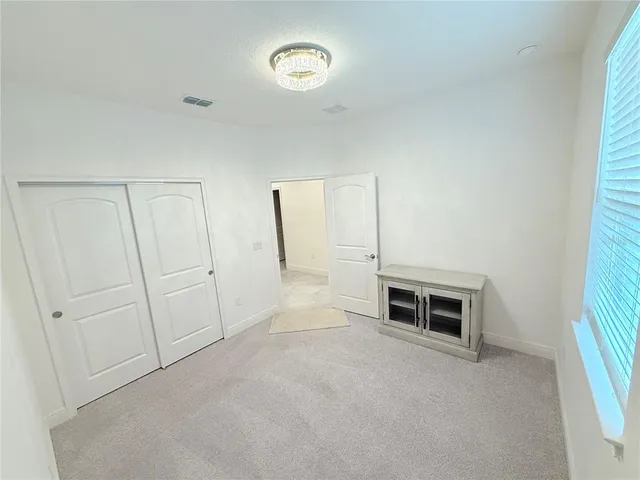 a view of a livingroom with furniture