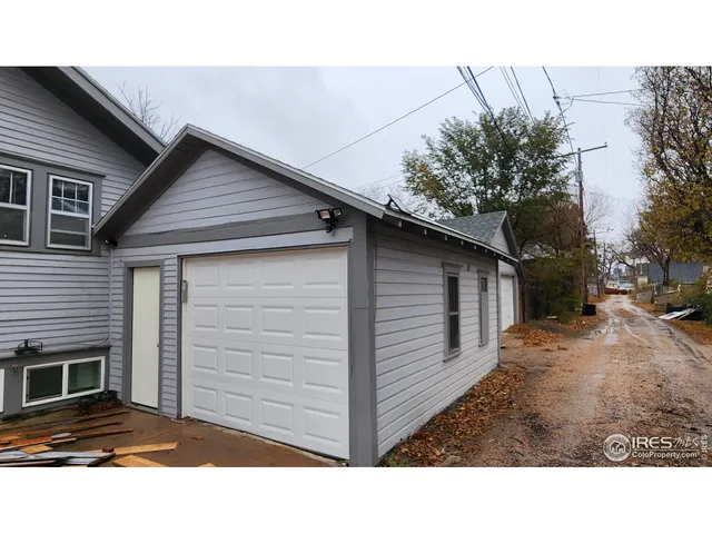 a black and white photo of a house