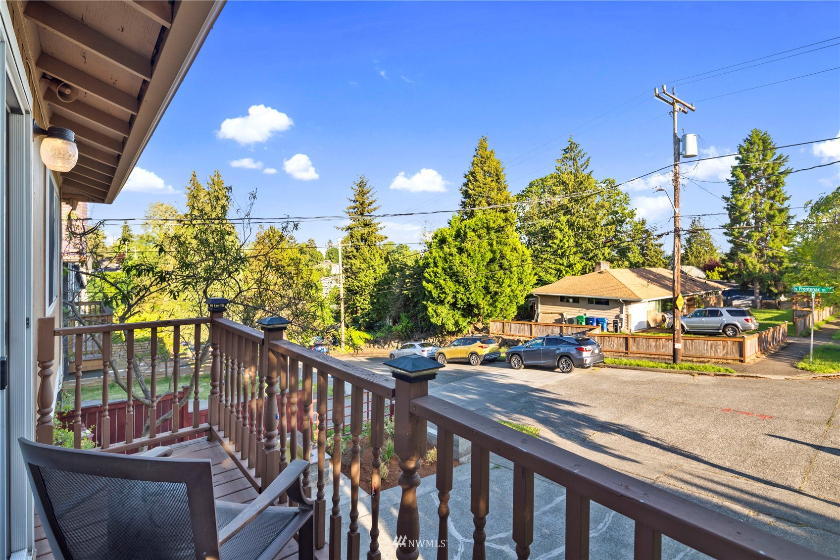 4800 South Frontenac Street Seattle, WA 98118 - Photo 19 of 40 a view of a street with sitting area