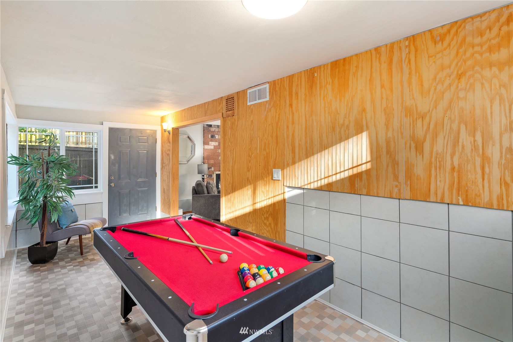4800 South Frontenac Street Seattle, WA 98118 - Photo 33 of 40 a room with pool table and glass windows