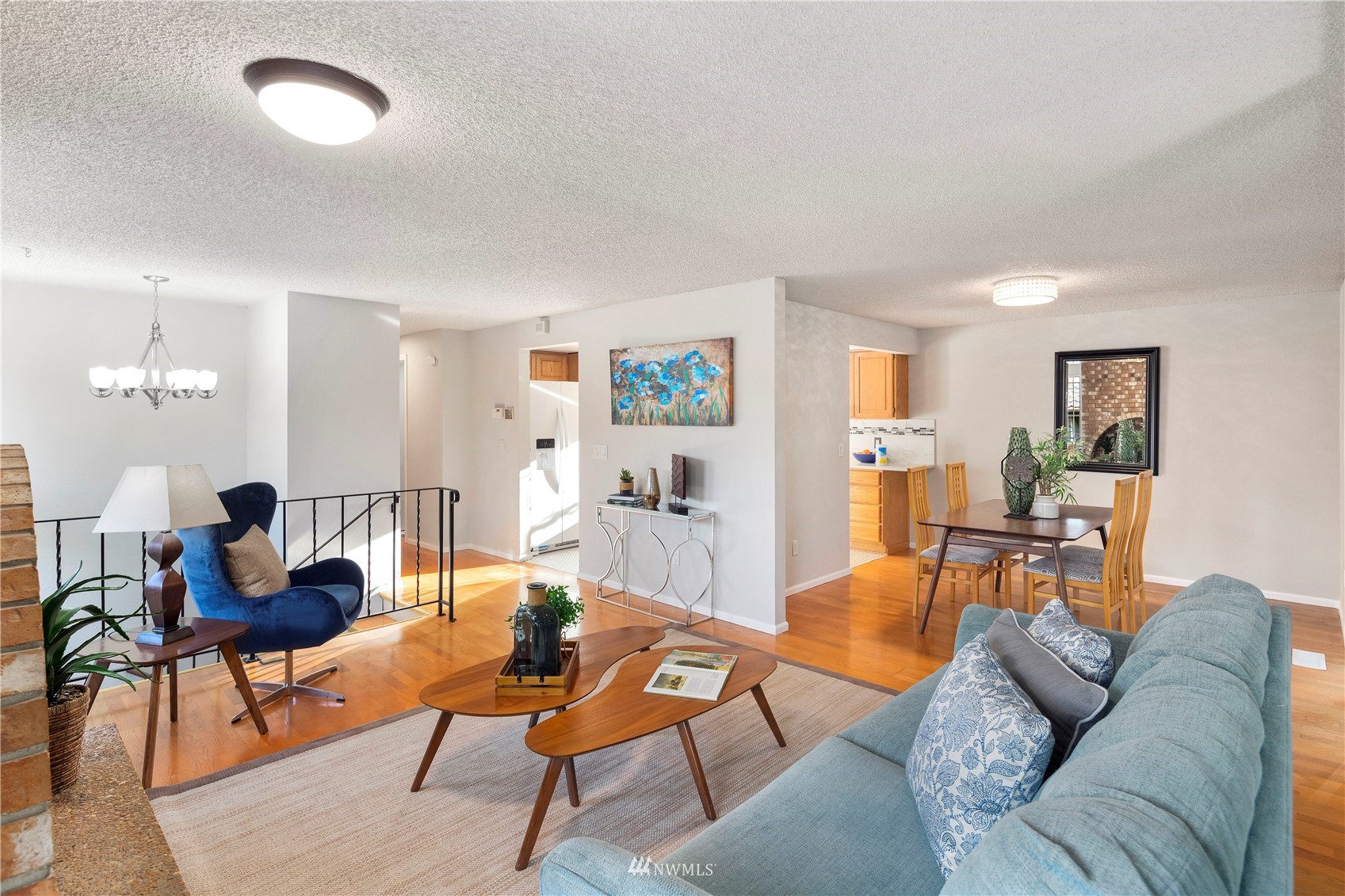 4800 South Frontenac Street Seattle, WA 98118 - Photo 6 of 40 a living room with furniture and wooden floor