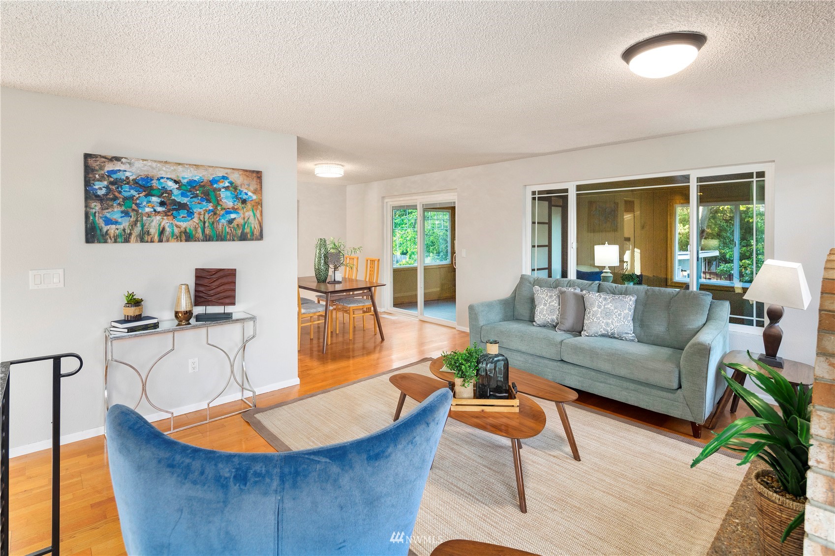 4800 South Frontenac Street Seattle, WA 98118 - Photo 7 of 40 a living room with furniture and a large window