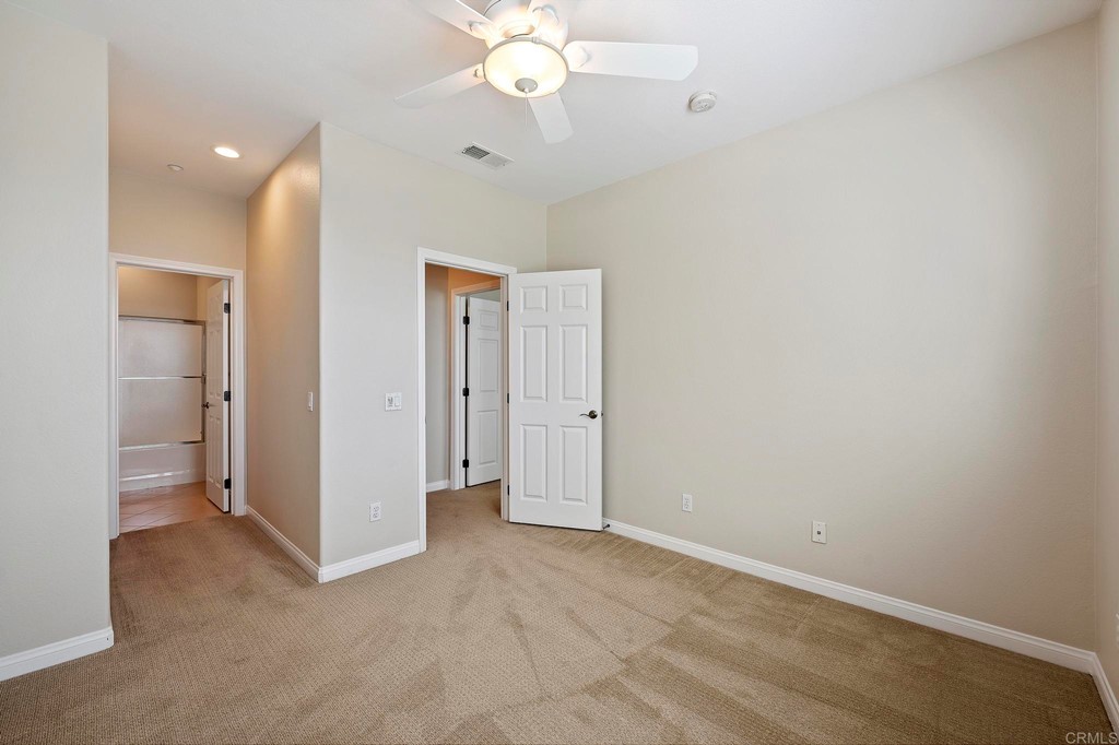 1295 Highbluff Avenue San Marcos, CA 92078 - Photo 20 of 38 an empty room with a bathroom