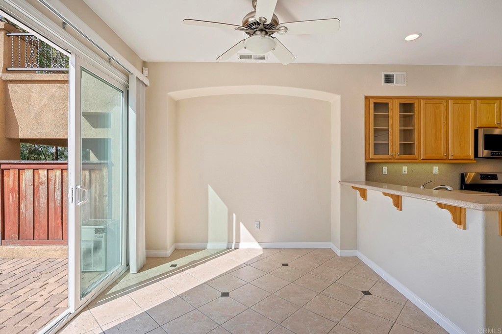 1295 Highbluff Avenue San Marcos, CA 92078 - Photo 10 of 38 wooden floor in an empty room with a window