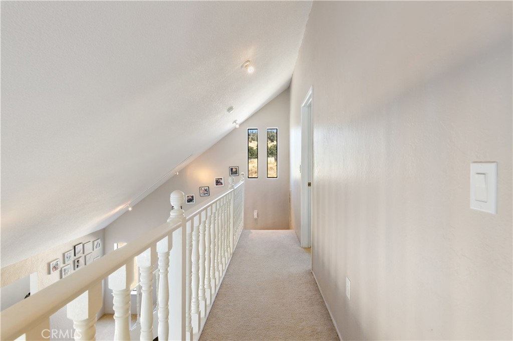 2225 Ladder Ridge Road Upper Lake, CA 95485 - Photo 22 of 58 a view of a hallway with wooden floor and entryway