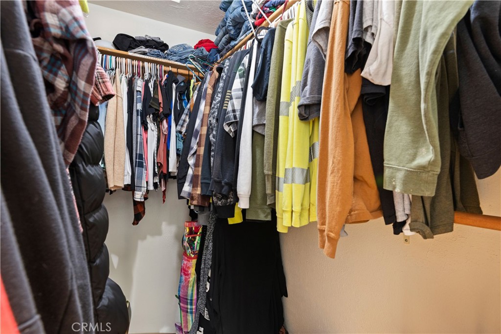 2225 Ladder Ridge Road Upper Lake, CA 95485 - Photo 25 of 58 a view of walk in closet with clothes and shoes