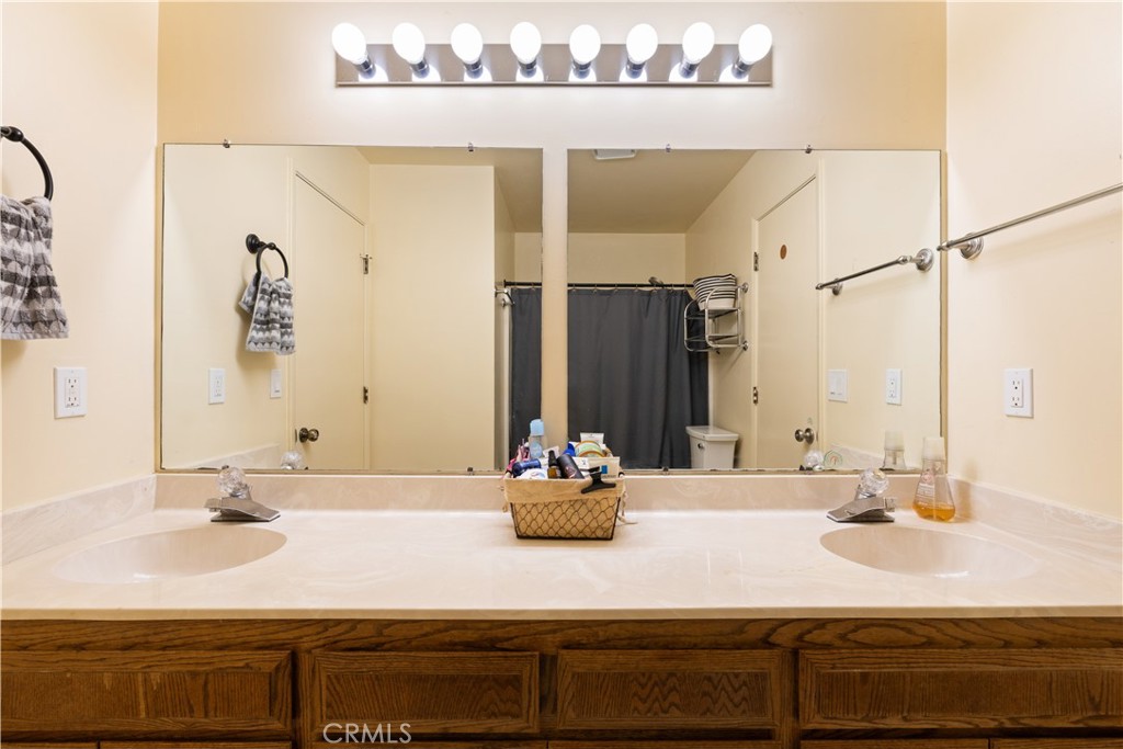 2225 Ladder Ridge Road Upper Lake, CA 95485 - Photo 26 of 58 a bathroom with a sink double vanity and a mirror