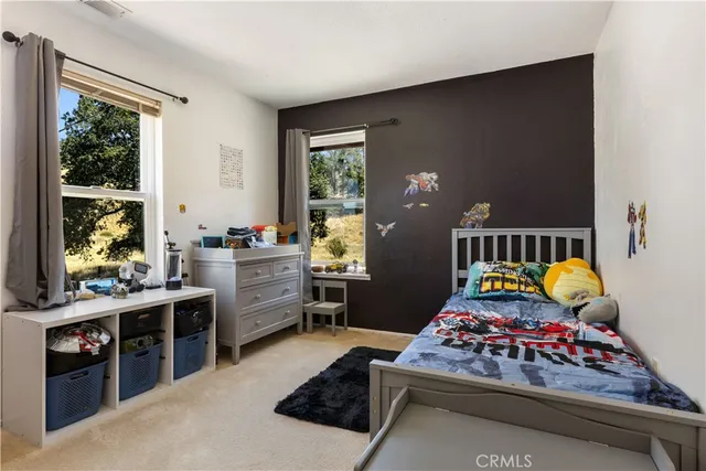 a view of pool with a big yard