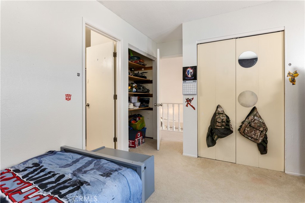 2225 Ladder Ridge Road Upper Lake, CA 95485 - Photo 29 of 58 a bedroom with a bed and a table