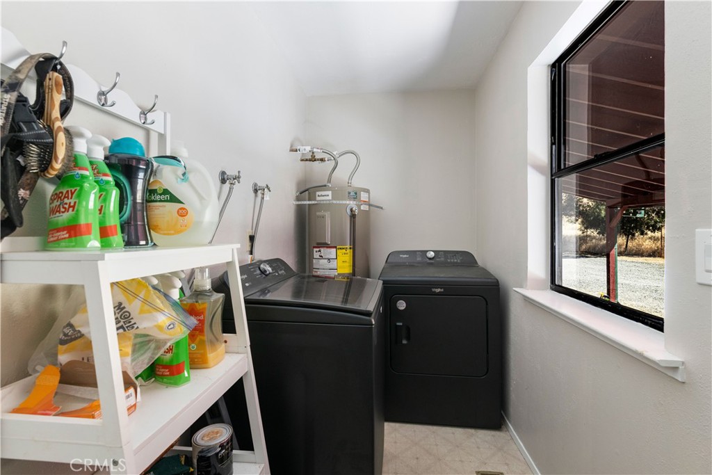 2225 Ladder Ridge Road Upper Lake, CA 95485 - Photo 39 of 58 a living room with furniture and a window